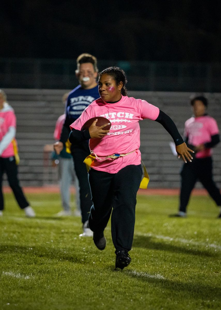 Students compete in the 2023 Powderpuff game. 