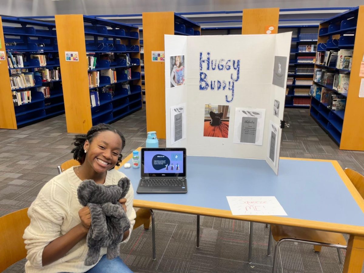 Jelena Francis displaying her Huggy Buddy personal project.