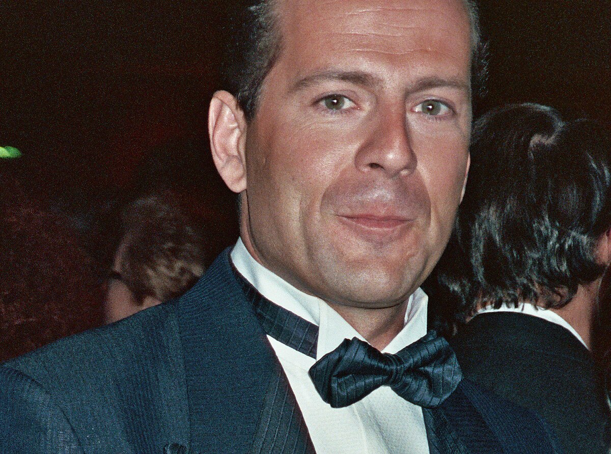 Bruce Willis in 1989. Photo by Alan Light, https://www.flickr.com/photos/alan-light/210255318/in/set-72157594230519758/