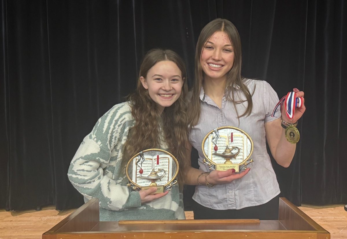 Senior Debaters Earn First Place in Competition